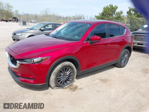 ✅ 2020 Mazda CX-5 Touring • VIN: JM3KFBCM2L0846174 • Lot: 42203758. Wystawiony na IAAI z przebiegiem 58 617 mil. Bezpłatny archiwum sprzedaży aukcyjnych z USA i szczegółowy raport historii pojazdu na DreamBid. Zdjęcie 2.