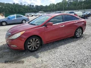 2012 Hyundai Sonata SE with VIN 5NPEC4AC9CH391654, listed as a Copart auction lot 56288655 with 307,490 mi miles and Salvage title. Bid and sale history available at DreamBid. Image 1.