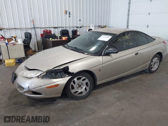 ✅ 2001 Saturn SC • VIN: 1G8ZP12841Z300417 • Лот: 42731965. Опубликован ранее на IAAI с пробегом 151 041 миль. Бесплатный доступ к архиву аукционных продаж из США и подробный отчёт об истории автомобиля на DreamBid. Изображение 2.