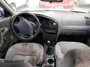 ✅ 2003 Kia Spectra • VIN: KNAFB121135283707 • Lot: 71500884. Wystawiony na Copart z przebiegiem 165 245 mil. Bezpłatny archiwum sprzedaży aukcyjnych z USA i szczegółowy raport historii pojazdu na DreamBid. Zdjęcie 8.