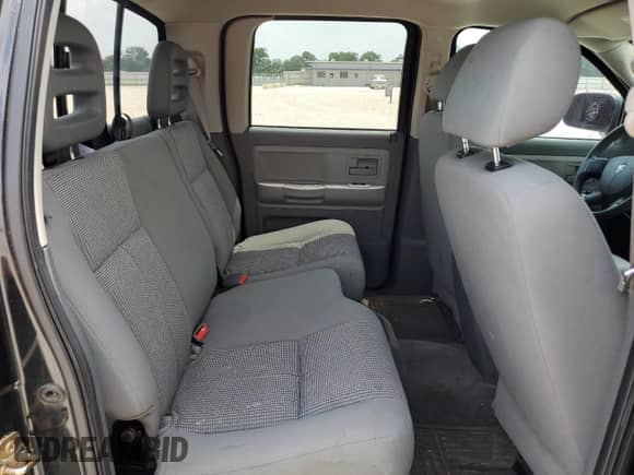 2007 Dodge Dakota SLT z VIN 1D7HW48K97S129325, wystawiony jako Copart lot #55304415 z przebiegiem 125 506 mil mil oraz Czysty tytuł • Clean title. Historia ofert i sprzedaży dostępna na DreamBid. Obrazek 10.