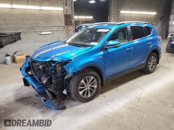 ✅ 2018 Toyota RAV4 Hybrid XLE • VIN: JTMRJREV4JD221155 • Лот: 52434395. Опубликован ранее на Copart с пробегом 102 160 миль. Бесплатный доступ к архиву аукционных продаж из США и подробный отчёт об истории автомобиля на DreamBid. Изображение 1.