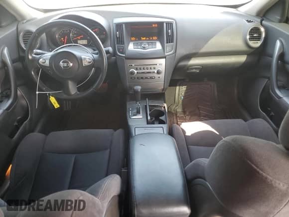 2012 Nissan Maxima S с VIN 1N4AA5AP5CC813191, выставлен на аукционе Copart как лот 80916265 с пробегом 118 418 миль миль и Списание • Salvage title. История ставок и продаж доступна на DreamBid. Изображение 8.