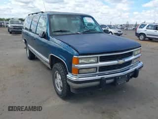 1994 Chevrolet Suburban z VIN 1GNFK16K2RJ394683, wystawiony jako IAAI lot #43185765 z przebiegiem 233 596 mil mil oraz . Historia ofert i sprzedaży dostępna na DreamBid. Obrazek 1.