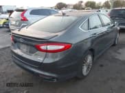 ✅ 2016 Ford Fusion Titanium • VIN: 3FA6P0K9XGR117621 • Lot: 43780558. Listed on IAAI with 144,994 mi. Free auction sales archive from the USA and detailed vehicle history report at DreamBid. Image 4.