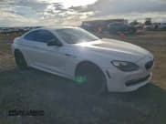 ✅ 2012 BMW 6 Series 650i xDrive • VIN: WBALX5C59CC894531 • Лот: 94411845. Опубликован ранее на Copart с пробегом 137 298 миль. Бесплатный доступ к архиву аукционных продаж из США и подробный отчёт об истории автомобиля на DreamBid. Изображение 4.