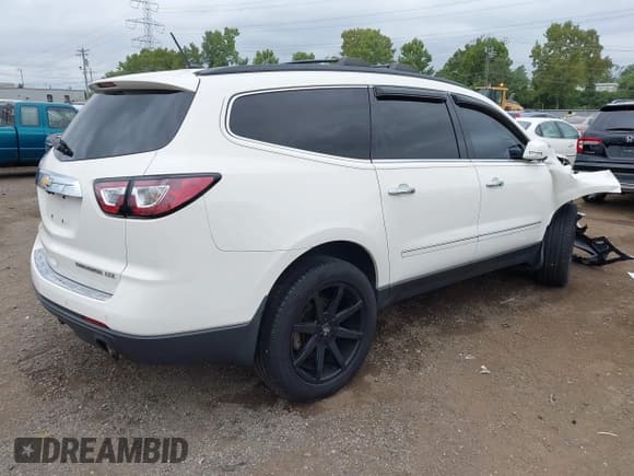 ✅ 2014 Chevrolet Traverse LTZ • VIN: 1GNKRJKD4EJ359381 • Lot: 43045392. Listed on IAAI with 186,015 mi. Free auction sales archive from the USA and detailed vehicle history report at DreamBid. Image 4.