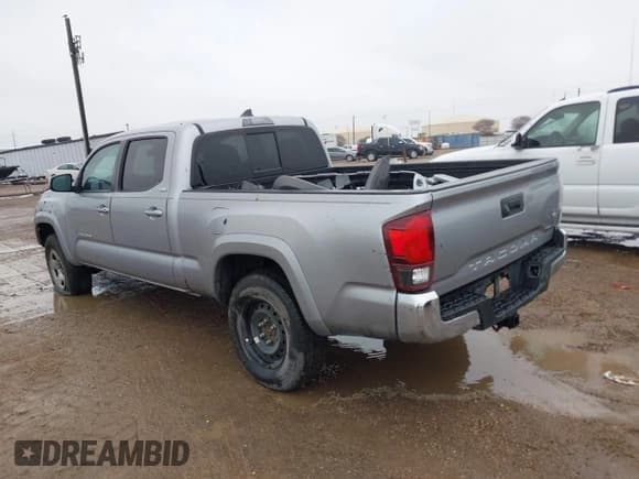 ✅ 2019 Toyota Tacoma SR5 • VIN: 5TFBZ5DN8KX004597 • Lot: 41286419. Listed on IAAI with 80,896 mi. Free auction sales archive from the USA and detailed vehicle history report at DreamBid. Image 3.