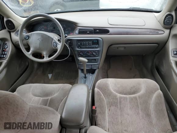 1998 Chevrolet Malibu LS z VIN 1G1NE52M9W6221499, wystawiony jako Copart lot #89144035 z przebiegiem 173 442 mil mil oraz Szkoda całkowita • Salvage title. Historia ofert i sprzedaży dostępna na DreamBid. Obrazek 8.