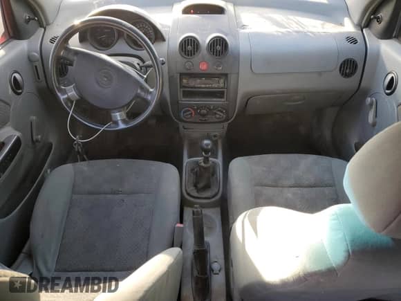 2005 Chevrolet Aveo LS с VIN KL1TD62665B433458, выставлен на аукционе Copart как лот 89824775 с пробегом 187 854 миль миль и Списание • Salvage title. История ставок и продаж доступна на DreamBid. Изображение 8.