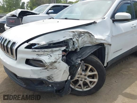 ✅ 2014 Jeep Cherokee Altitude • VIN: 1C4PJMCS2EW128356 • Lot: 42513328. Listed on IAAI with 89,884 mi. Free auction sales archive from the USA and detailed vehicle history report at DreamBid. Image 6.