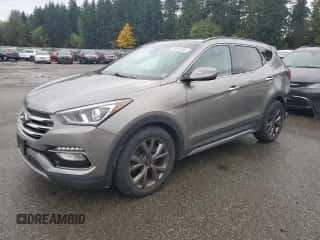 2017 Hyundai Santa Fe Ultimate z VIN 5XYZWDLA3HG485502, wystawiony jako Copart lot #90261245 z przebiegiem 84 872 mil mil oraz Szkoda całkowita • Salvage title. Historia ofert i sprzedaży dostępna na DreamBid. Obrazek 1.
