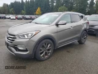 2017 Hyundai Santa Fe Ultimate with VIN 5XYZWDLA3HG485502, listed as a Copart auction lot 90261245 with 84,872 mi miles and Salvage title. Bid and sale history available at DreamBid. Image 1.