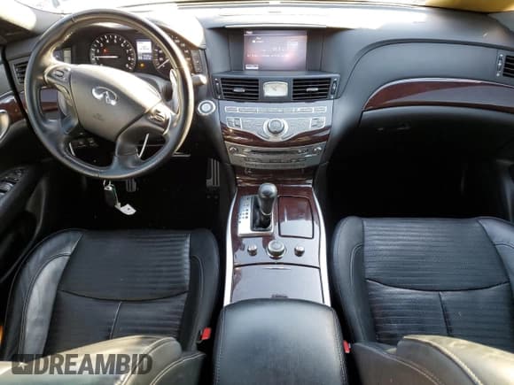 ✅ 2015 Infiniti Q70 • VIN: JN1BY1AR2FM562619 • Lot: 87215234. Listed on Copart with 79,128 mi. Free auction sales archive from the USA and detailed vehicle history report at DreamBid. Image 8.