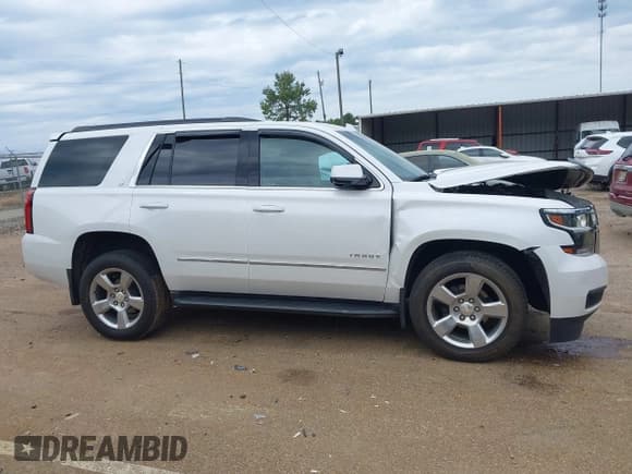 ✅ 2020 Chevrolet Tahoe LT • VIN: 1GNSCBKC4LR181887 • Lot: 42160821. Wystawiony na IAAI z przebiegiem 106 757 mil. Bezpłatny archiwum sprzedaży aukcyjnych z USA i szczegółowy raport historii pojazdu na DreamBid. Zdjęcie 13.
