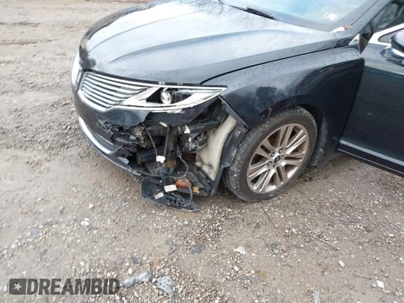 ✅ 2014 Lincoln MKZ • VIN: 3LN6L2J92ER805995 • Lot: 43605738. Listed on IAAI with 126,412 mi. Free auction sales archive from the USA and detailed vehicle history report at DreamBid. Image 6.