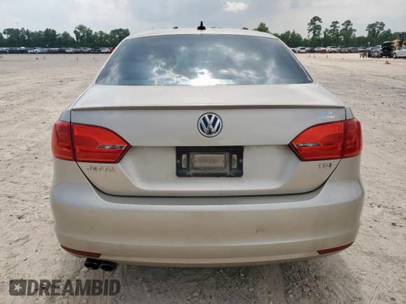 ✅ 2014 Volkswagen Jetta TDI w/Premium/Nav • VIN: 3VWLL7AJ9EM303770 • Lot: 59393425. Listed on Copart with 191,050 mi. Free auction sales archive from the USA and detailed vehicle history report at DreamBid. Image 6.