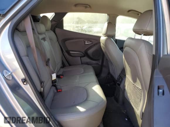 2015 Hyundai Tucson SE z VIN KM8JUCAG6FU073232, wystawiony jako Copart lot #69346454 z przebiegiem 149 216 mil mil oraz Nie do naprawy • Non repairable. Historia ofert i sprzedaży dostępna na DreamBid. Obrazek 10.