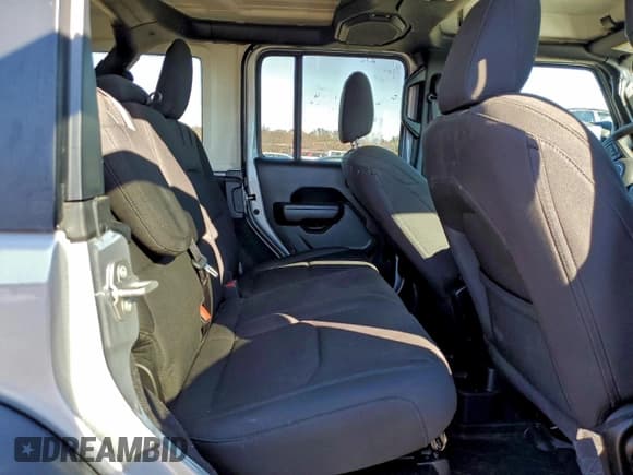 ✅ 2023 Jeep Wrangler • VIN: 1C4JJXN68PW661306 • Lot: 94741365. Wystawiony na Copart z przebiegiem 33 200 mil. Bezpłatny archiwum sprzedaży aukcyjnych z USA i szczegółowy raport historii pojazdu na DreamBid. Zdjęcie 10.