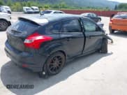 ✅ 2014 Ford Focus ST • VIN: 1FADP3L98EL127163 • Lot: 42965574. Listed on IAAI with 136,032 mi. Free auction sales archive from the USA and detailed vehicle history report at DreamBid. Image 4.