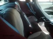 ✅ 2015 BMW i8 • VIN: WBY2Z2C5XFV674362 • Лот: 77100464. Опубликован ранее на Copart с пробегом 67 061 миль. Бесплатный доступ к архиву аукционных продаж из США и подробный отчёт об истории автомобиля на DreamBid. Изображение 10.