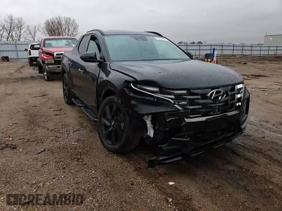 2023 Hyundai Santa Cruz Night Edition с VIN 5NTJCDAF4PH045429, выставлен на аукционе Copart как лот 77806794 с пробегом 12 240 миль миль и Списание • Salvage title. История ставок и продаж доступна на DreamBid. Изображение 10.