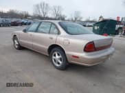 ✅ 1999 Oldsmobile 88 LS • VIN: 1G3HN52K0X4827550 • Лот: 41322257. Опубликован ранее на IAAI с пробегом 129 212 миль. Бесплатный доступ к архиву аукционных продаж из США и подробный отчёт об истории автомобиля на DreamBid. Изображение 3.