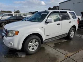 ✅ 2008 Ford Escape Hybrid • VIN: 1FMCU49H28KE29900 • Lot: 90936185. Listed on Copart with 202,962 mi. Free auction sales archive from the USA and detailed vehicle history report at DreamBid. Image 1.