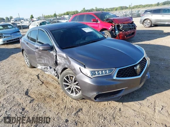 ✅ 2020 Acura TLX • VIN: 19UUB1F34LA015460 • Lot: 43251693. Listed on IAAI with 146,947 mi. Free auction sales archive from the USA and detailed vehicle history report at DreamBid. Image 1.