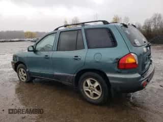 2001 Hyundai Santa Fe GLS z VIN KM8SC83D11U103866, wystawiony jako Copart lot #88311825 z przebiegiem 201 152 mil mil oraz Szkoda całkowita • Salvage title. Historia ofert i sprzedaży dostępna na DreamBid. Obrazek 2.