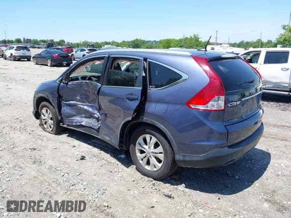 ✅ 2012 Honda CR-V EX-L • VIN: JHLRM4H79CC007250 • Lot: 42372532. Listed on IAAI with 122,519 mi. Free auction sales archive from the USA and detailed vehicle history report at DreamBid. Image 3.