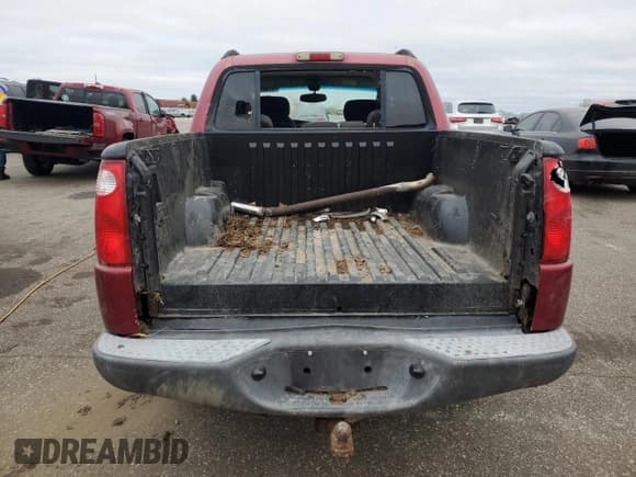 ✅ 2004 Ford Explorer Sport Trac XLS • VIN: 1FMZU77K34UA15257 • Лот: 87301815. Опубликован ранее на Copart с пробегом 137 945 миль. Бесплатный доступ к архиву аукционных продаж из США и подробный отчёт об истории автомобиля на DreamBid. Изображение 6.