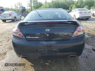 2008 Hyundai Tiburon GS с VIN KMHHM66D28U287992, выставлен на аукционе Copart как лот 55080195 с пробегом 125 922 миль миль и На запчасти • Non repairable. История ставок и продаж доступна на DreamBid. Изображение 6.