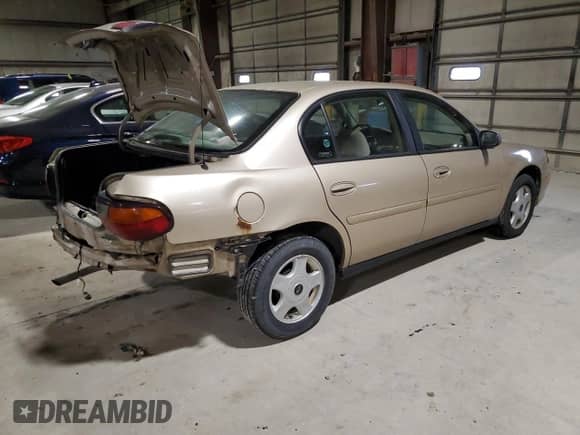 2002 Chevrolet Malibu with VIN 1G1ND52J02M512973, listed as a Copart auction lot 80936164 with 203,159 mi miles and Salvage title. Bid and sale history available at DreamBid. Image 3.