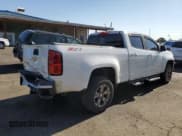 ✅ 2018 Chevrolet Colorado 4WD Z71 • VIN: 1GCGTDEN6J1148764 • Лот: 63839505. Опубликован ранее на Copart с пробегом 117 415 миль. Бесплатный доступ к архиву аукционных продаж из США и подробный отчёт об истории автомобиля на DreamBid. Изображение 3.