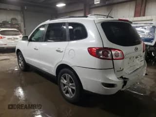 ✅ 2012 Hyundai Santa Fe Limited • VIN: 5XYZKDAG6CG110098 • Lot: 84957014. Listed on Copart with 133,418 mi. Free auction sales archive from the USA and detailed vehicle history report at DreamBid. Image 2.