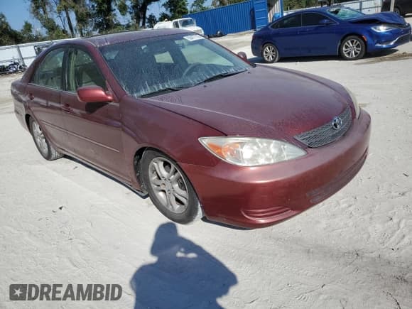 ✅ 2004 Toyota Camry LE • VIN: 4T1BE32K54U311931 • Lot: 93477115. Listed on Copart with 241,230 mi. Free auction sales archive from the USA and detailed vehicle history report at DreamBid. Image 4.