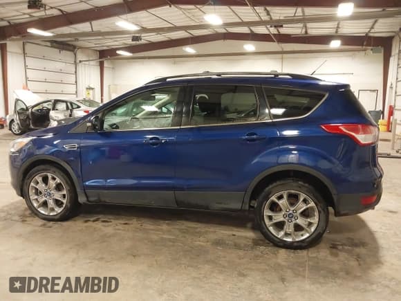 ✅ 2013 Ford Escape SEL • VIN: 1FMCU9HX4DUC70866 • Lot: 42147923. Wystawiony na IAAI z przebiegiem 150 006 mil. Bezpłatny archiwum sprzedaży aukcyjnych z USA i szczegółowy raport historii pojazdu na DreamBid. Zdjęcie 14.