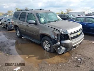 ✅ 2014 Chevrolet Tahoe LT • VIN: 1GNSCBE08ER117923 • Lot: 43575355. Listed on IAAI with 143,512 mi. Free auction sales archive from the USA and detailed vehicle history report at DreamBid. Image 1.