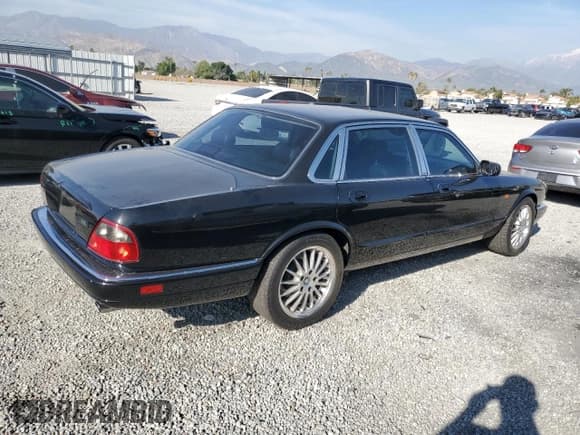 ✅ 1996 Jaguar XJ • VIN: SAJPX1147TC784778 • Lot: 49997885. Listed on Copart with 209,185 mi. Free auction sales archive from the USA and detailed vehicle history report at DreamBid. Image 3.