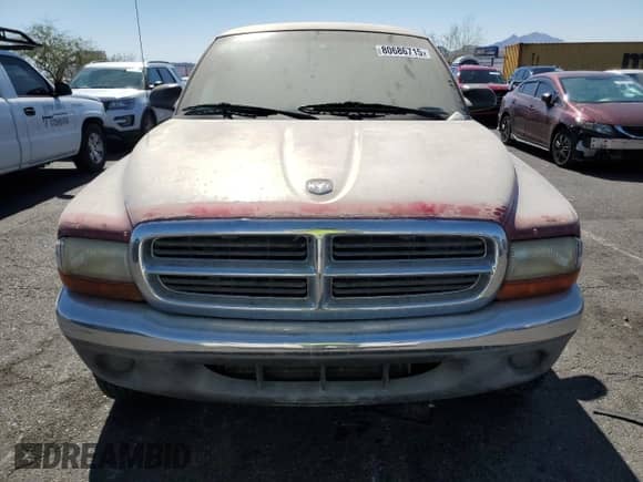 1999 Dodge Dakota SLT z VIN 1B7GG22X5XS215601, wystawiony jako Copart lot #80686715 z przebiegiem 273 332 mil mil oraz Czysty tytuł • Clean title. Historia ofert i sprzedaży dostępna na DreamBid. Obrazek 5.