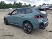 ✅ 2024 BMW X1 • VIN: WBX13EF0XR5Z97754 • Lot: 64200945. Wystawiony na Copart z przebiegiem 28 918 mil. Bezpłatny archiwum sprzedaży aukcyjnych z USA i szczegółowy raport historii pojazdu na DreamBid. Zdjęcie 2.