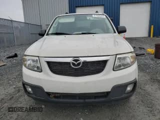 ✅ 2011 Mazda Tribute Grand Touring • VIN: 4F2CY9GG5BKM00754 • Лот: 81936224. Опубликован ранее на Copart с пробегом 124 454 миль. Бесплатный доступ к архиву аукционных продаж из США и подробный отчёт об истории автомобиля на DreamBid. Изображение 5.