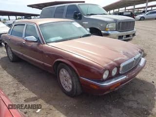 ✅ 1998 Jaguar XJ Vanden Plas • VIN: SAJKX624XWC820876 • Lot: 42366163. Listed on IAAI with Not provided. Free auction sales archive from the USA and detailed vehicle history report at DreamBid. Image 1.