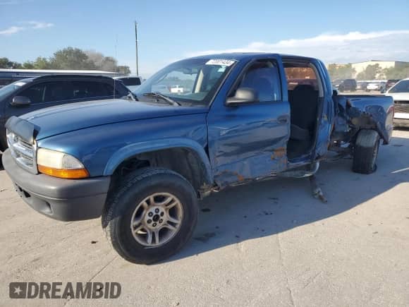 ✅ 2004 Dodge Dakota Sport • VIN: 1D7HG38N14S770031 • Лот: 72001434. Размещён на Copart с пробегом 131 547 миль миль. Получите бесплатный доступ к архиву аукционных продаж из США и посмотрите подробный отчёт об истории автомобиля на DreamBid. Изображение 1.