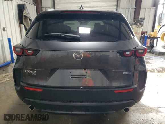 ✅ 2025 Mazda CX-50 Hybrid Preferred Package • VIN: 7MMVAABW5SN110008 • Лот: 87268085. Опубликован ранее на Copart с пробегом 5 338 миль. Бесплатный доступ к архиву аукционных продаж из США и подробный отчёт об истории автомобиля на DreamBid. Изображение 6.