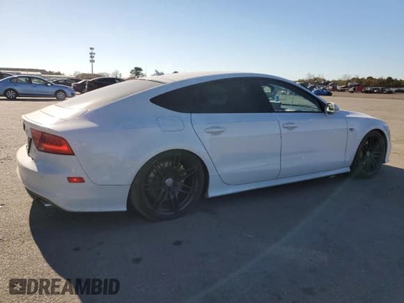 ✅ 2014 Audi S7 Prestige • VIN: WAUW2AFC2EN047713 • Lot: 79287844. Listed on Copart with 104,410 mi. Free auction sales archive from the USA and detailed vehicle history report at DreamBid. Image 3.