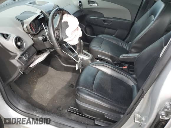 2015 Chevrolet Sonic LTZ с VIN 1G1JE5SB6F4198871, выставлен на аукционе Copart как лот 49139704 с пробегом 112 508 миль миль и Списание • Salvage title. История ставок и продаж доступна на DreamBid. Изображение 7.