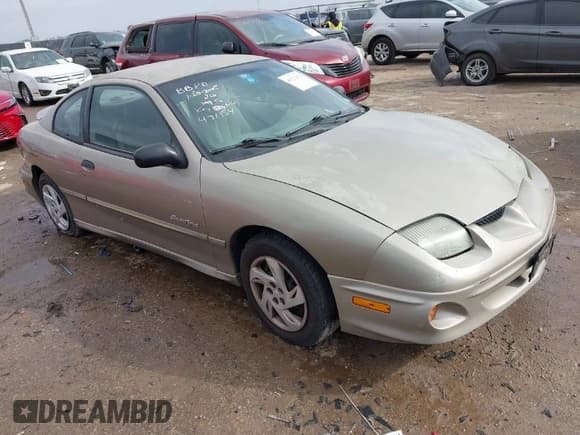 ✅ 2002 Pontiac Sunfire SE • VIN: 1G2JB124X27186228 • Lot: 41522301. Listed on IAAI with 121,251 mi. Free auction sales archive from the USA and detailed vehicle history report at DreamBid. Image 1.