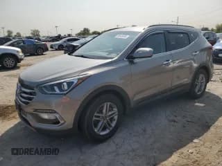 ✅ 2017 Hyundai Santa Fe 2.4L • VIN: 5NMZUDLB2HH028894 • Лот: 70141974. Опубликован ранее на Copart с пробегом 124 839 миль. Бесплатный доступ к архиву аукционных продаж из США и подробный отчёт об истории автомобиля на DreamBid. Изображение 1.